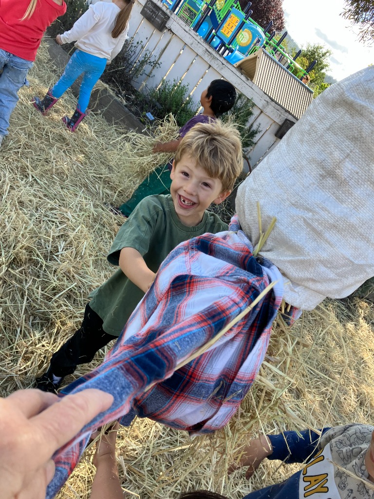 Student smiling in the garden
